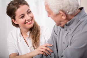 Caregiver with elderly man