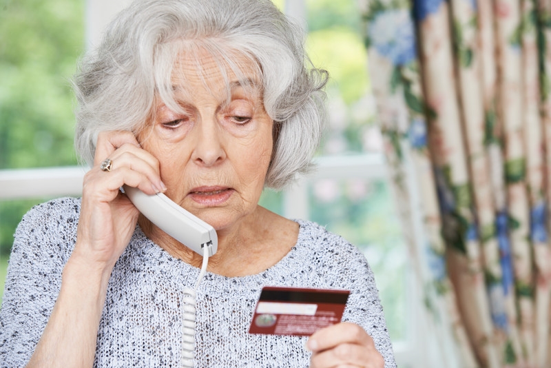 Elderly woman being scammed