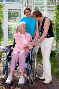 Homehealth aide with elderly woman.